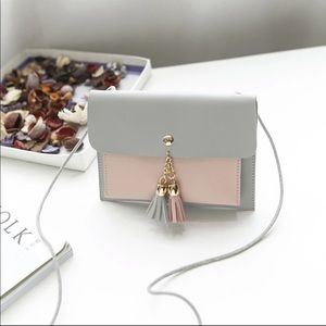 Pink and gray satchel